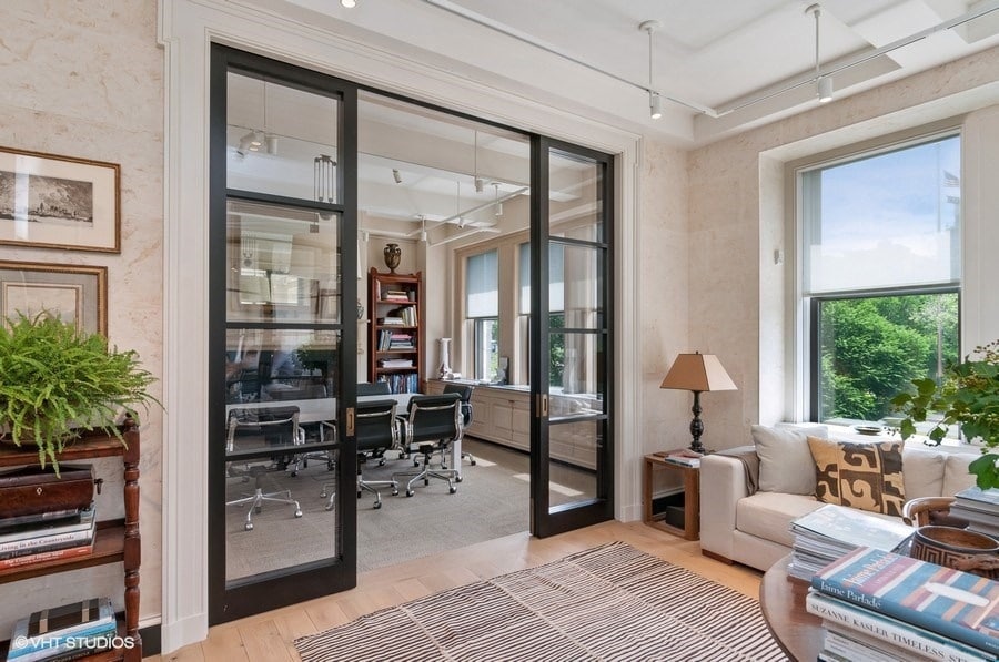 Transparent pocket doors opening into an office